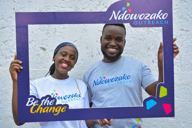 Two team members holding the Ndowozako frame